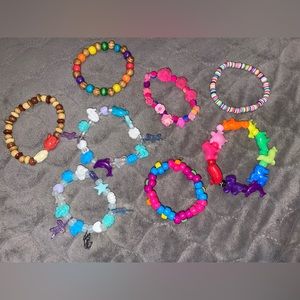 Kandi charm bracelets.